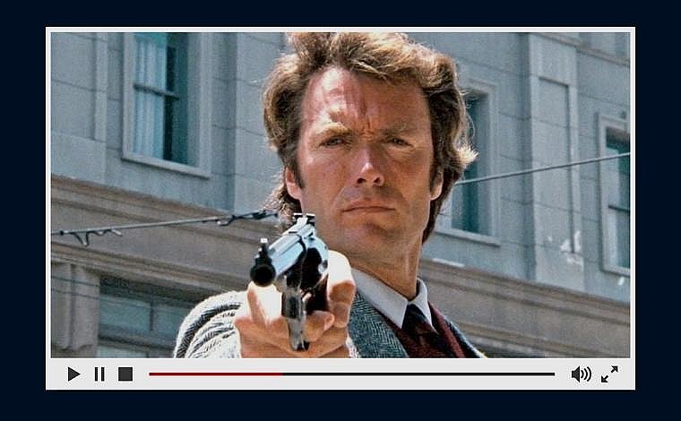 Dirty Harry (Clint Eastwood) aims a gun at his target.