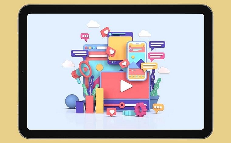 A laptop screen displays icons for authors social media marketing.